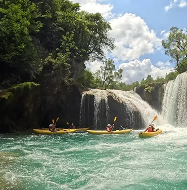 Kayak safari tour on Mreznica River, a nature adventure near Rastoke and Plitvice Lakes.