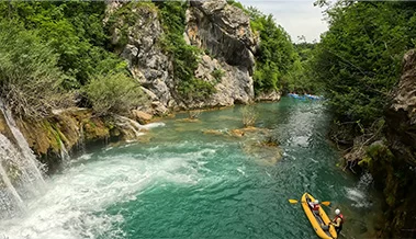 Kayak safari tour on Mreznica River, a nature adventure near Rastoke and Plitvice Lakes.